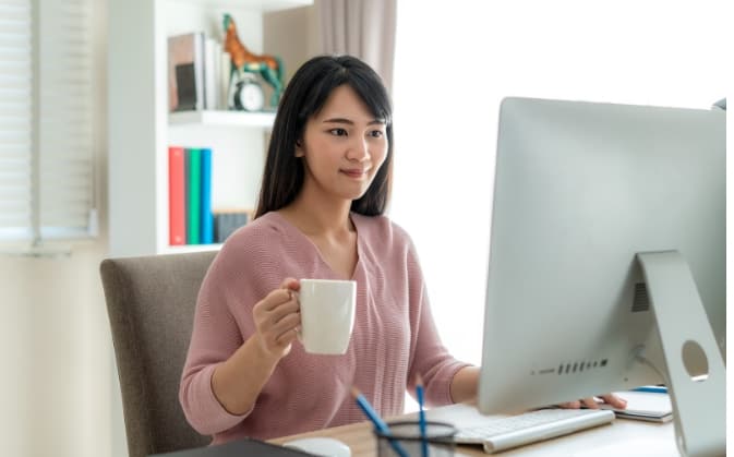 Girl Browsing for a Loan on the Internet