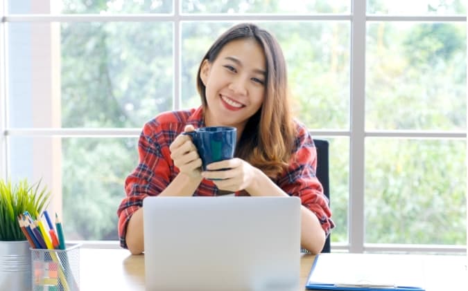 A Person Drinking Tea in An Office